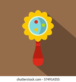 Colorful baby rattle icon. Flat illustration of colorful baby rattle vector icon for web   on coffee background