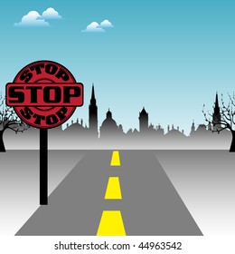 Colorful background with red stop symbol near a street which leads into a town