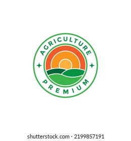 colorful badge with agriculture field and sunset logo