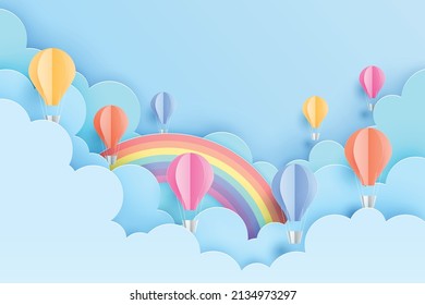 Colorful balloon, cloud, and rainbow with blue sky in paper art style vector illustration.