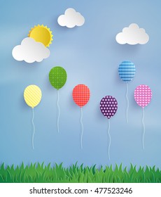 colorful balloon flying high in the air with sun shine.paper art style.