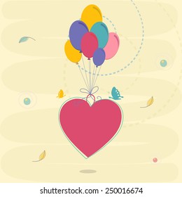 Colorful balloons binding by a pink heart for Happy Valentine's Day celebration.