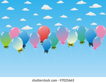 colorful balloons in the blue sky with white clouds