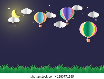 Colorful balloons float on night sky with beautiful moon and little stars in green field. Vector paper cutting.