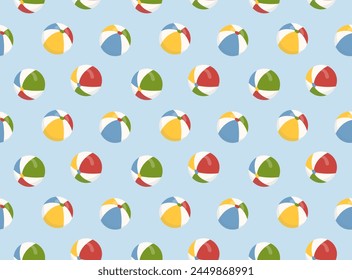 Colorful beach balls scattered across a light blue backdrop, capturing the essence of playful summer days and fun at the seaside