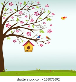 Colorful birds and birdhouse on tree branch vector/illustration