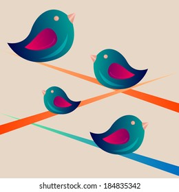 Colorful birds sitting on a branch