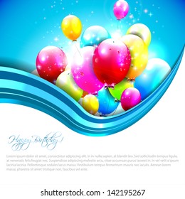 Colorful birthday balloons on blue background