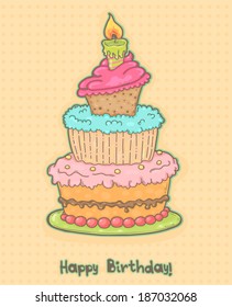 Colorful birthday cake with one candle.