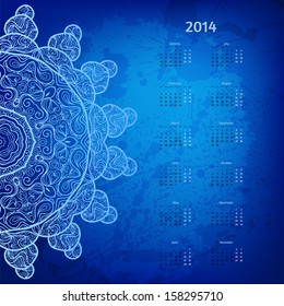 Colorful blue 2014 year vector calendar with round lace ornament and grunge artistic stains