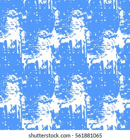 Colorful blue and white grunge seamless pattern with abstract hand drawn brush strokes and paint splashes. Messy infinity texture, modern grungy background. Vector illustration. 