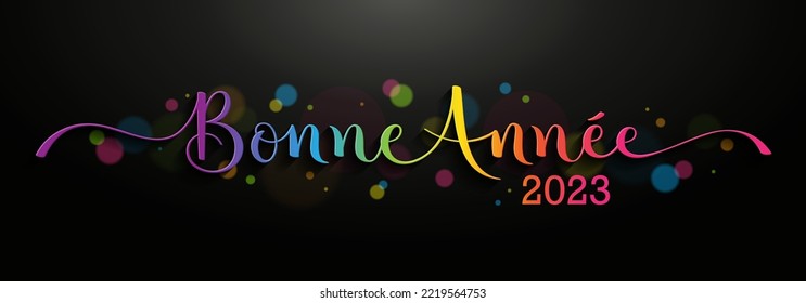 Colorful BONNE ANNEE (HAPPY NEW YEAR in French) brush calligraphy banner with stars on black background