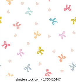 Colorful bows and hearts pattern on white background 