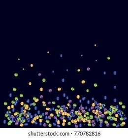 Colorful bright confetti on dark blue background