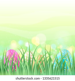 Colorful bright Easter eggs hidden in grass background. Good for greeting card cover banner design.