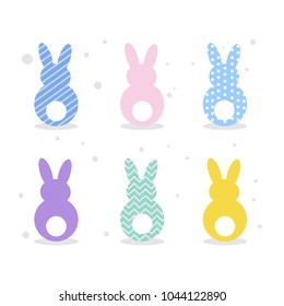 Colorful and bright Easter rabbits set on white.