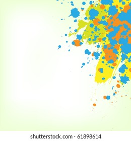 Colorful bright ink splashes on green background