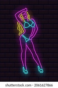 Colorful bright neon silhouette of beautiful woman. Editable color and brightness. Transparent glow. Brick wall background. Icon