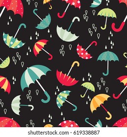 Colorful bright umbrellas seamless pattern modern design with water drops. Vector illustration on dark background.