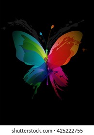 Colorful butterfly created from splash and colored objects.