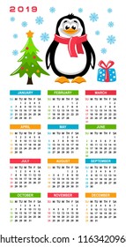 Colorful calendar 2019 with cute penguin. Cartoon character, christmas tree and gift box on a white background. Week starts on Sunday. Basic grid. Flat style. Vector illustration.