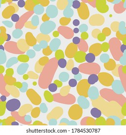 Coloridas manchas de color caramelo sin fisuras patrón vectorial. Diseño decorativo de papel de superficie pastel para telas, textiles, papel de papelería, papel de rayado, envoltura de regalo y embalaje.