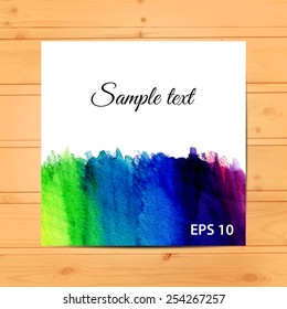 Colorful card on wood texture. Vector background. Bright watercolor brush strokes. Template. Place for text.