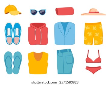 Colorful casual collection of folded clothes, footwear and accessories. Top view of lying folded trousers, T-shirt, sweatshirt, jacket, sneakers, hat, cap, swimsuit.