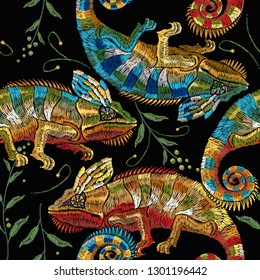 Colorful chameleons and palm leaves seamless pattern.  Jungle background. Fashion template for clothes, textiles, t-shirt design. Classical lizard chameleons in tropical forest 