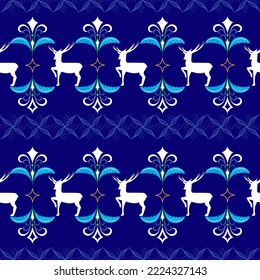 Colorful christmas deer on blue seamless pattern. Fashion graphic background design. Modern stylish abstract texture for holiday. Colorful template for prints, textiles, wrapping. Vector illustration