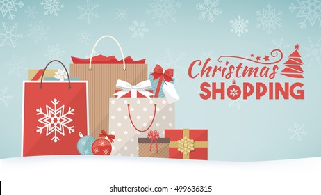 Colorful christmas gifts, shopping bags and decorations on the snow, xmas shopping concept banner