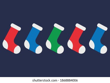 Colorful Christmas socks on blue background.