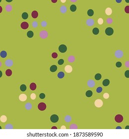 colorful clusters of circles on a green background seamless vector repeat