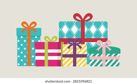 Colorful collection of five beautifully wrapped gift boxes with large ribbons is shown on a neutral background.