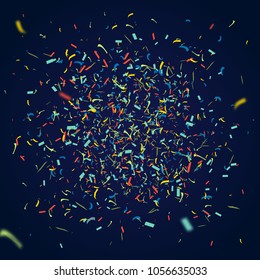 Colorful confetti flying randomly. explosion of particles from the center on dark background. Abstract background can be used for holidays, greeting cards, birthday