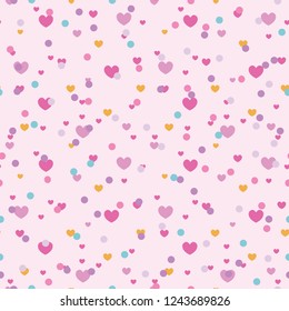 Colorful confetti hearts seamless repeat pattern. Great for Valentines Day or wedding invitations, cards, backgrounds, gifts, packaging design projects. Surface pattern design.