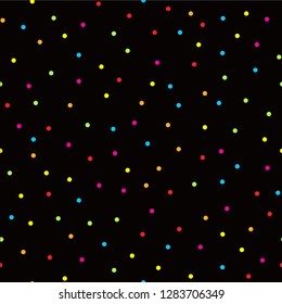 Colorful confetti on black background. Seamless vector pattern