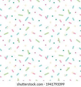 Colorful confetti, sprinkles, dots vector seamless pattern background for party, celebration design.