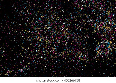 Colorful confetti vector on black background. Grainy abstract random texture design element. Colorful party background with glitter, sprinkles and space for your text on black. Distress. 