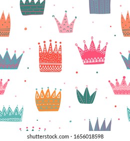 Colorful crowns seamless pattern. Tiaras repeated print. Girlish repeat ornament for fashion textile, clothes, wrapping paper. Princess elements