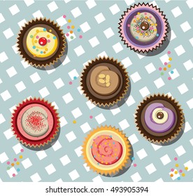 Colorful cupcakes. Vector illustration