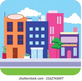 Colorful and cute central street front stores blue sky background. With tree and flowers for decorations.