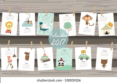 colorful cute monthly calendar 2017 with lion,tiger,panda,tree and bear travel vacation.Can be used for web,banner,poster,label and printable