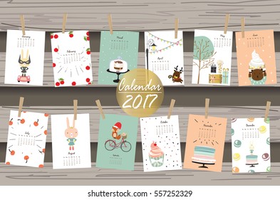 Colorful cute monthly calendar 2017 with rabbit,cake,cherry,bear,reindeer,girl,strawberry and fox