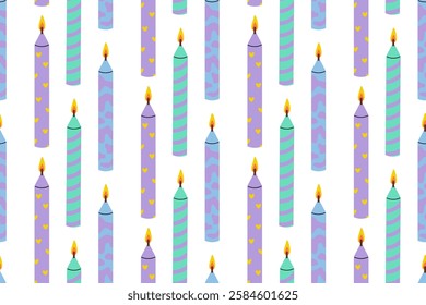 Colorful decorative candles arranged in a playful pattern on a white background