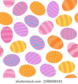 Colorful decorative eggs scattered across a white background for spring celebrations and holiday festivities.