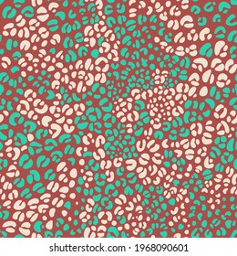 Colorful decorative leopard print design. African animal skin print fur texture background. Spotted vector seamless pattern.