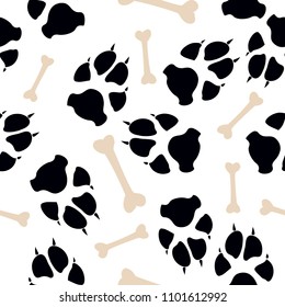 Colorful dog or cat footprint and bone vector seamless pattern. Contrast paw bone seamless template, isolated on white background. Drawn silhouette clipart for marketing purposes or wallpaper print.