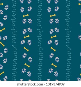 Colorful dog footprint and bone trek seamless pattern. Trendy paw bone seamless template, isolated on contrast color background. Drawn silhouette vector for business purposes or cover print.