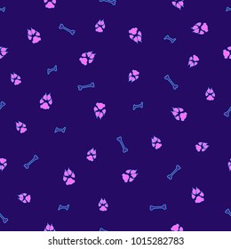 Colorful dog footprint and bone vector seamless pattern. Cool paw bone seamless template, isolated on contrast color backdrop. Drawn silhouette clipart for corporate purposes or wallpaper print.